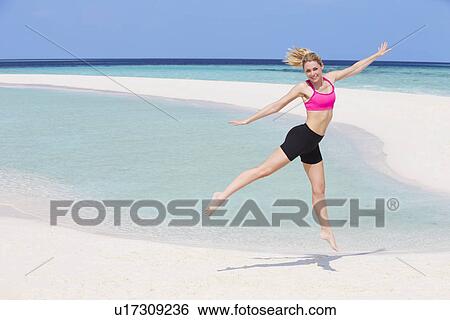 Woman Exercising On Beautiful Beach View Large Photo Image Stock Photograph - Woman Exercising On Beautiful Beach. Fotosearch