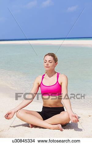 Woman Meditating On Beautiful Beach View Large Photo Image Picture - Woman Meditating On Beautiful Beach. Fotosearch