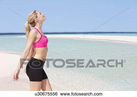 Woman Meditating On Beautiful Beach View Large Photo Image Stock Photograph - Woman Meditating On Beautiful Beach. Fotosearch