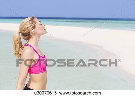 Woman Meditating On Beautiful Beach View Large Photo Image Stock Photography - Woman Meditating On Beautiful Beach. Fotosearch
