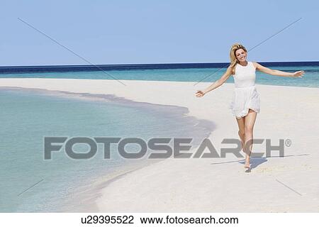 Woman Running On Beautiful Tropical Beach View Large Photo Image Stock Image - Woman Running On Beautiful Tropical Beach. Fotosearch