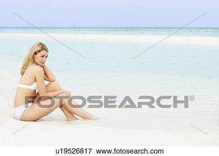 Woman Sunbathing On Beautiful Beach Holiday View Large Photo Image Stock Photo - Woman Sunbathing On Beautiful Beach Holiday. Fotosearch