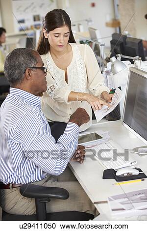 Workers At Desks In Busy Creative Office View Large Photo Image Stock Image - Workers At Desks In Busy Creative Office. Fotosearch