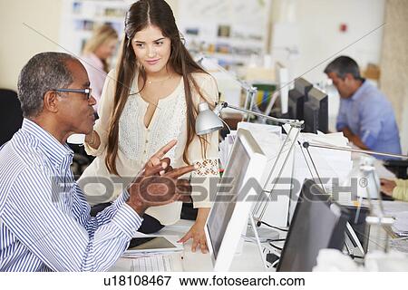 Workers At Desks In Busy Creative Office View Large Photo Image Stock Photo - Workers At Desks In Busy Creative Office. Fotosearch