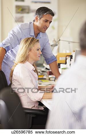 Workers At Desks In Busy Creative Office View Large Photo Image Stock Photography - Workers At Desks In Busy Creative Office. Fotosearch