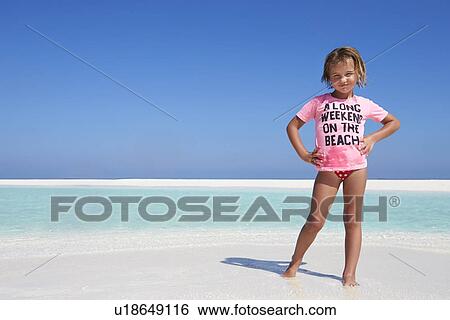Young Girl Enjoying Beach Holiday View Large Photo Image Stock Photograph - Young Girl Enjoying Beach Holiday. Fotosearch