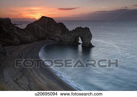 Picture - Durdle Door panorama at sunrise, Dorset, England. Fotosearch