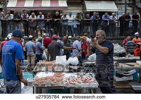 Fish vendor, Catania Fish market, Sicily, Italy View Large Photo Image Picture - Fish vendor, Catania Fish market, Sicily, Italy. Fotosearch