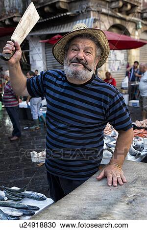 Fish vendor, Catania Fish market, Sicily, Italy View Large Photo Image Stock Image - Fish vendor, Catania Fish market, Sicily, Italy. Fotosearch