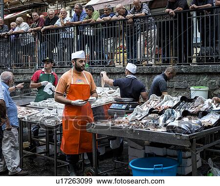 Fish vendor, Catania Fish market, Sicily, Italy View Large Photo Image Stock Photo - Fish vendor, Catania Fish market, Sicily, Italy. Fotosearch