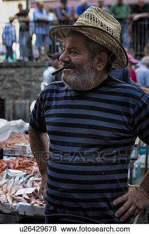 Fish vendor, Catania Fish market, Sicily, Italy View Large Photo Image Stock Photo - Fish vendor, Catania Fish market, Sicily, Italy. Fotosearch