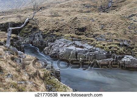 Flowing river of Glen Etive in winter, Glen Coe, Scotland View Large Photo Image Stock Photo - Flowing river of Glen Etive in winter, Glen Coe, Scotland. Fotosearch