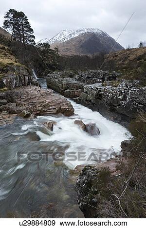 Flowing river of Glen Etive in winter, Glen Coe, Scotland View Large Photo Image Stock Photo - Flowing river of Glen Etive in winter, Glen Coe, Scotland. Fotosearch