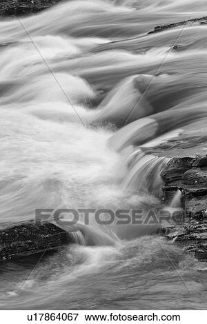 Stock Photo - Flowing waters of Glen Orchy, Scotland. Fotosearch