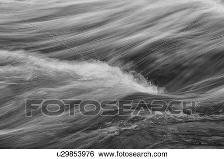 Stock Photograph - Flowing waters of Glen Orchy, Scotland. Fotosearch