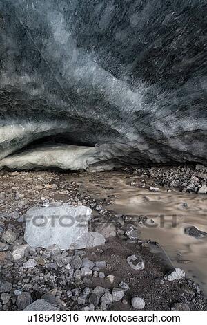 Stock Photograph - Ice cave at Skaftafell, Iceland. Fotosearch
