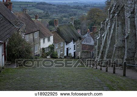Stock Photography - Iconic Gold Hill thatched cottages, Shaftesbury, England. Fotosearch