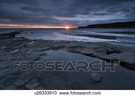Kimmeridge tidal pools at sunset, Dorset, England View Large Photo Image Stock Image - Kimmeridge tidal pools at sunset, Dorset, England. Fotosearch