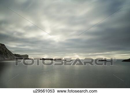 Stock Image - Man o'War cove, Lulworth, Dorset, England. Fotosearch