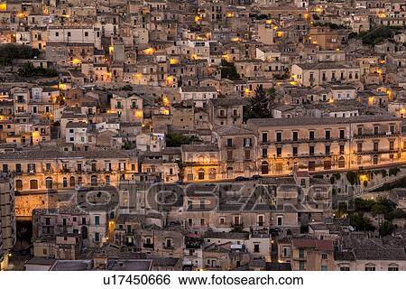 Modica aerial twilight view, Sicily, Italy View Large Photo Image Stock Photograph - Modica aerial twilight view, Sicily, Italy. Fotosearch