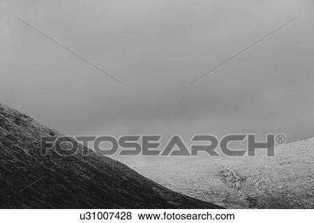 Stock Photo - Mountain shapes at dusk, Buchaille Etive Mor, Glen Coe, Scotlan. Fotosearch