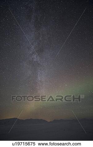 Stock Photography - Northern lights and Milky Way over Dimmifjallgardur, Iceland. Fotosearch