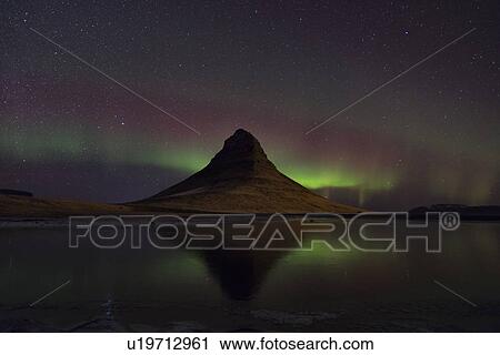 Stock Image - Northern lights over Kirkjufell mountain, Snaefellnes, Iceland. Fotosearch