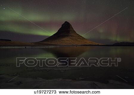 Stock Image - Northern lights over Kirkjufell mountain, Snaefellnes, Iceland. Fotosearch