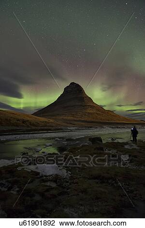 Stock Image - Northern lights over Kirkjufell mountain, Grundarfjordur, Snaef. Fotosearch