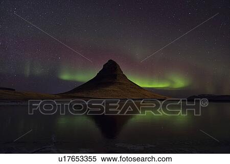 Stock Photography - Northern lights over Kirkjufell mountain, Snaefellnes, Iceland. Fotosearch