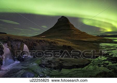 Stock Photography - Northern lights over Kirkjufell mountain, Grundarfjordur, Snaef. Fotosearch