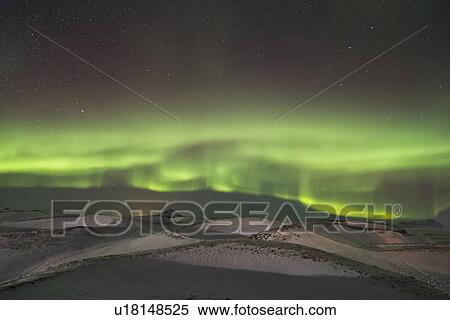 Stock Photography - Northern lights over Myvatn volcanic caldera, Iceland. Fotosearch