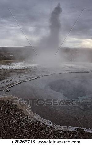 Stock Photograph - Plumes of steam at Geysir, Iceland. Fotosearch