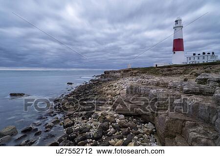 Stock Image -  Portland Bill in moody sunrise, Dorset, England. Fotosearch