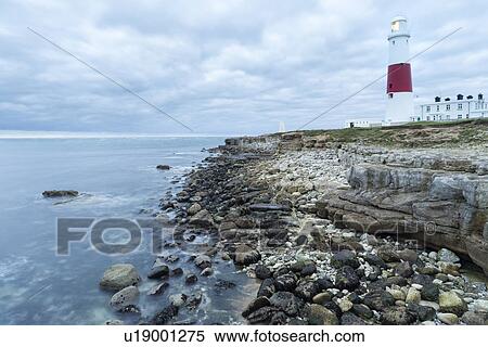 Stock Photography -  Portland Bill in moody sunrise, Dorset, England. Fotosearch