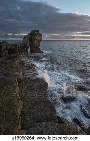 Picture - Pulpit Rock at sunset, Portland, Dorset, England. Fotosearch