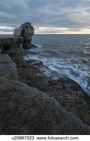 Pulpit Rock at sunset, Portland, Dorset, England View Large Photo Image Stock Image - Pulpit Rock at sunset, Portland, Dorset, England. Fotosearch