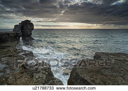 Pulpit Rock at sunset, Portland, Dorset, England View Large Photo Image Stock Image - Pulpit Rock at sunset, Portland, Dorset, England. Fotosearch