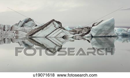 Striped icebergs at Jokulsarlon lagoon, sunrise, Iceland View Large Photo Image Stock Photo - Striped icebergs at Jokulsarlon lagoon, sunrise, Iceland. Fotosearch