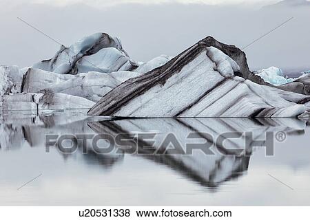 Striped icebergs at Jokulsarlon lagoon, sunrise, Iceland View Large Photo Image Stock Photo - Striped icebergs at Jokulsarlon lagoon, sunrise, Iceland. Fotosearch