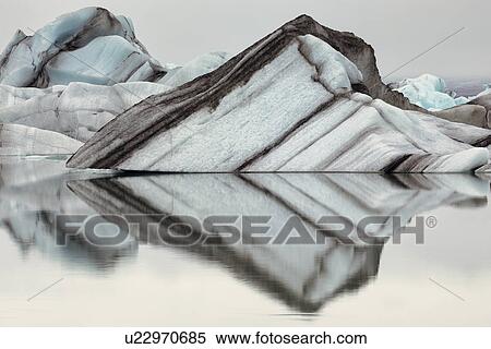 Striped icebergs at Jokulsarlon lagoon, sunrise, Iceland View Large Photo Image Stock Photography - Striped icebergs at Jokulsarlon lagoon, sunrise, Iceland. Fotosearch