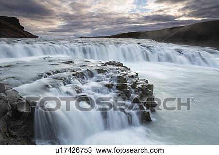 Stock Image - Sunrise at Gullfoss, Iceland. Fotosearch