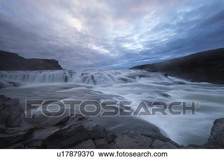 Stock Image - Sunrise at Gullfoss, Iceland. Fotosearch