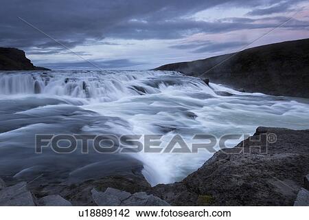 Stock Image - Sunset at Gullfoss, Iceland. Fotosearch