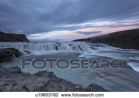 Stock Image - Sunset at Gullfoss, Iceland. Fotosearch