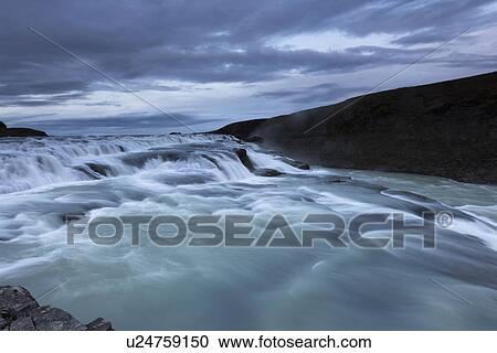 Stock Image - Sunset at Gullfoss, Iceland. Fotosearch