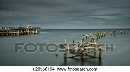 Swanage pier in tranquillity, Dorset, England View Large Photo Image Picture - Swanage pier in tranquillity, Dorset, England. Fotosearch