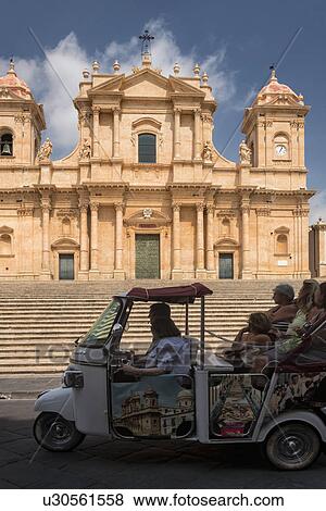 Tourists admire San Nicolo Catedrale, Noto, Sicily, Italy View Large Photo Image Stock Photo - Tourists admire San Nicolo Catedrale, Noto, Sicily, Italy. Fotosearch