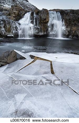 Waterfall at Grundarfjordur in winter, Snaefellnes, Iceland View Large Photo Image Stock Photograph - Waterfall at Grundarfjordur in winter, Snaefellnes, Iceland. Fotosearch