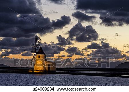 Picture - Windmills at Trapani saline pans, twilight, Sicily, Italy. Fotosearch